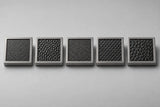Five cast aluminum samples showing the background textures, left to right: leatherette, pebble, sand, stipple and classic leather