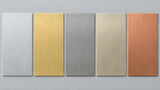 Five blank thin-gauge plates, left to right: aluminum, brass, stainless steel, nickel silver and copper